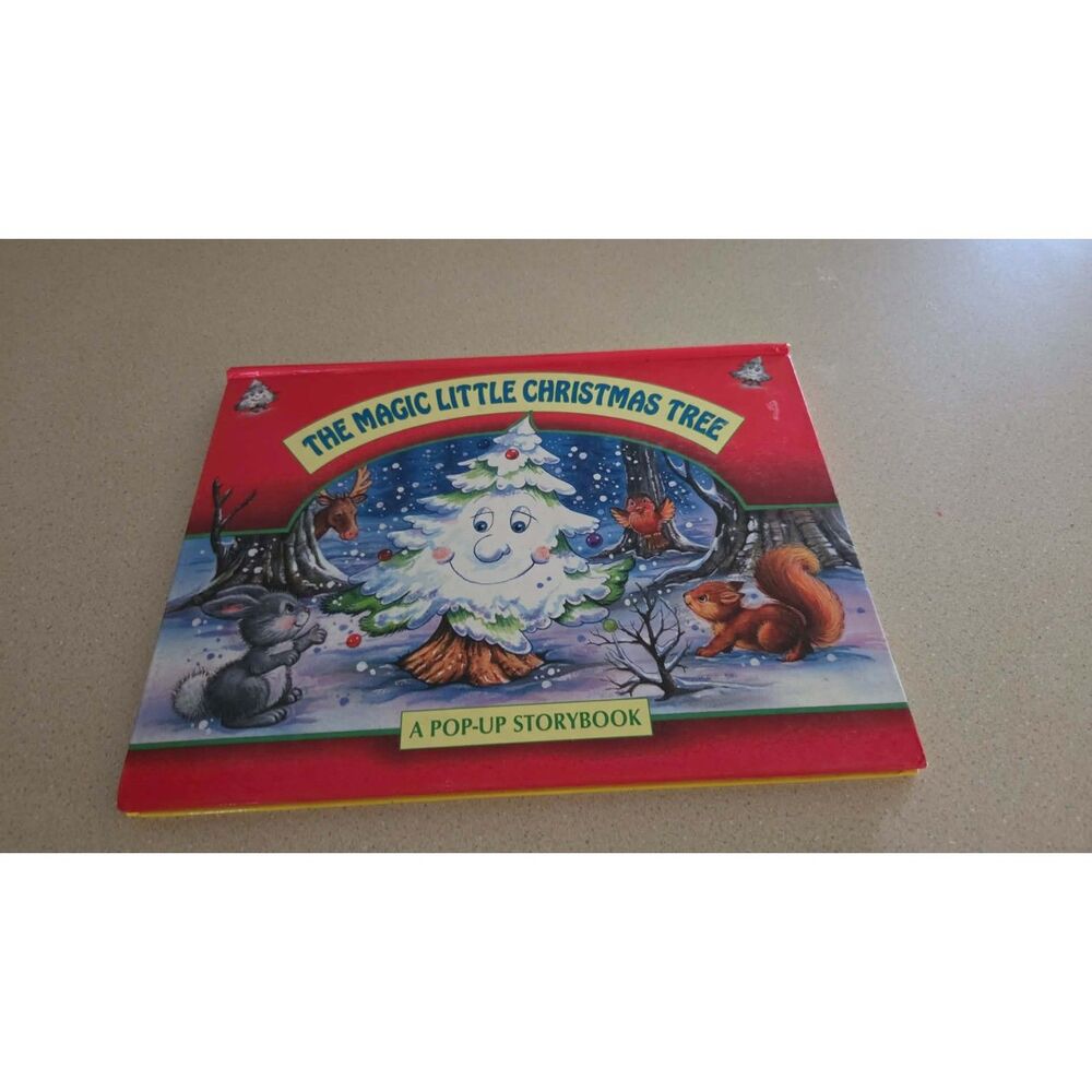 The Magic Christmas Tree ( a pop-up storybook) by Npp Book